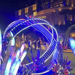 A truly out-of-this-world photo opportunity. For this celestial-themed sangeet, I created this installation with a spherical structure and large, glowing crystals, making guests feel like they're posing in another galaxy.