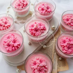 This was a custom order of bridal shower return gifts. I created these beautiful two-toned Plumeria flower candles in an ombre pink glass jar, complete with custom stickers and packaging.