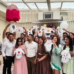 A baby shower with a creative twist! Friends and family came together to paint these adorable custom onesies, creating personal and heartfelt gifts for the baby-to-be. It's a wonderful way to make lasting memories.