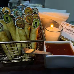Getting into the spooky spirit for a Halloween party! Our "Finger Rolls" are served with a blood-red dipping sauce and decorated with fun, spooky toppers.
