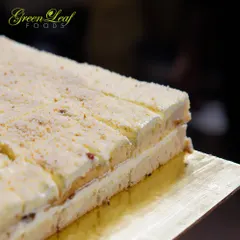 A close up of a beautiful layered pastry, ready to be served. I believe desserts should be as visually appealing as they are delicious, and I take care to create sweets that are a feast for the eyes.