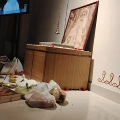 Offerings of sweets and fruits placed before the Sadhguru Sannidhi during Guru Purnima. Every offering is made with gratitude for the path and the presence of the Guru.