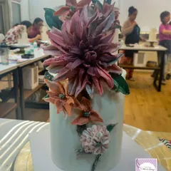 Here is the two-tiered cake with chocolate-sculpted dahlias that I created during the workshop. It was a struggle at first, but I really enjoyed the process once I got the hang of it. I'm excited to practice this technique more before offering it for orders.