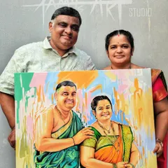 A wonderful anniversary gift. This couple holds their custom acrylic painting, which features my signature colorful and abstract style.