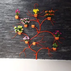 This metal tree wall art is a beautiful and space saving solution for plant lovers. We can customize the size and color to fit your wall perfectly.