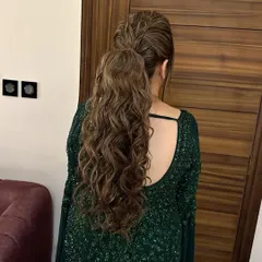 Love is in the texture. This messy, textured ponytail is one of my favorite styles to create for bridesmaids or for a cocktail event. It's effortlessly chic.