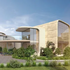 A close-up render of the Cipla Museum, highlighting the smooth, stone-like texture of the façade and the large, curved glass walls. The design is meant to feel both monumental and approachable.