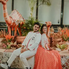 The couple poses against the Turkish-themed decor, complete with decorated camel props and terracotta pots. We create multiple photo-friendly spots within each event for lasting memories.
