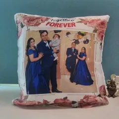 A personalized cushion featuring a beautiful family portrait. I can print any high-quality photo to create a cozy and sentimental piece of home decor, perfect for your living room or as a gift.