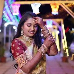 A reception is a time for glamour. For this bride, I created a stunning evening look with shimmering eyeshadow and a bold lip, set against beautiful lighting that makes her glow.