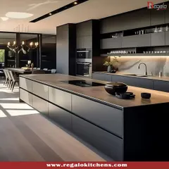 Bold and sophisticated, this all-black island kitchen makes a powerful statement. We used matte black finishes and a solid countertop to create a monolithic, modern look, complemented by subtle under-island lighting for ambiance. This design is for those who appreciate daring, minimalist style.