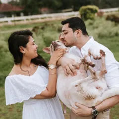 Capturing the playful and trusting bond you share is my favorite part of any pet photoshoot. Here, this sweet Indie is being cradled like a baby, showing the complete comfort and affection within the family.