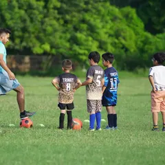 A coach and his players. We learn and grow together as a team.