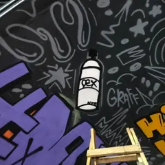 A close-up detail from the "HIPHOP INDIA" tunnel mural. The piece is filled with small hip-hop and graffiti culture references, like this stylized spray can with my "DEX" tag.