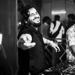 Eyes on the crowd, beats in the blood. This black and white portrait captures the intense connection I feel with my audience.