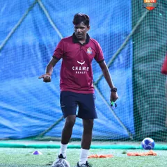 Guidance from the best. An Elite FS coach provides a live demonstration on the turf. Our coaching is hands-on, ensuring every player understands the technique and tactics perfectly.