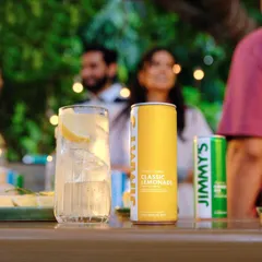Another moment from the Jimmy's Cocktail party scene. The focus on the can and the prepared drink in the foreground, with the social interaction blurred in the back, perfectly balances product and lifestyle.