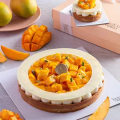 Our exquisite Mango Tart, filled with vanilla pastry cream and topped with a generous amount of fresh, diced Alphonso mangoes. The buttery shortcrust shell provides the perfect base for this seasonal star.