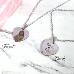 This heart-shaped pendant is double the love. We engrave your favorite photo on the front and your names on the back, creating a two-sided keepsake that’s full of meaning.