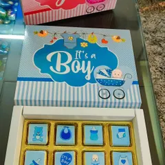 Here is the 'It's a Girl' version of my custom chocolate announcement box, next to the 'It's a Boy' one. I can create these in any quantity you need to share your wonderful news.