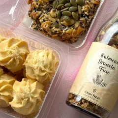 A healthy and delicious combination, this photo shows my gluten-free almond cookies alongside a bar of my multigrain seed-topped brittle.