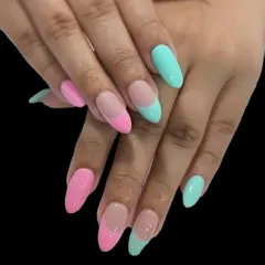 A fun, mismatched take on the French manicure. This design uses a different pastel color for each hand, with bright pink and aqua tips on long, almond-shaped nails.