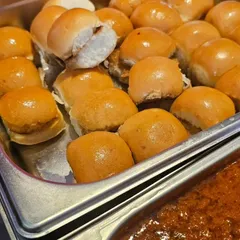 I am excited to introduce Mini Pav with Bhaji to our menu. These bite-sized buns are perfect for parties, making it easy for guests to enjoy this classic dish.