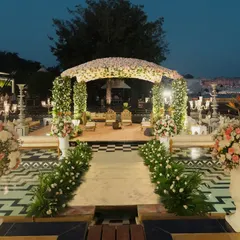 This breathtaking floral dome mandap was designed to feel like a floating paradise on the waters of Udaipur. I specialize in creating such destination wedding setups that blend natural beauty with grand design.