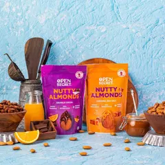A beautifully styled group shot of Open Secret products. I use props and careful arrangement to create a story around the product, highlighting the key ingredients like orange and chocolate.