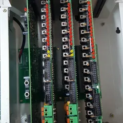 A close up of the connection terminals inside the intercom panel where each phone line is wired.