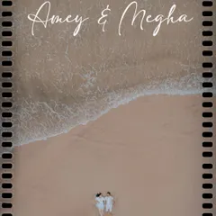 An aerial drone shot from a pre-wedding session on the beach. This perspective adds a unique and epic scale to your love story, capturing the beauty of the landscape alongside your connection.