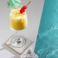 Time for a poolside drink? This Pina Colada gel candle looks just like the frosty cocktail, complete with a little umbrella and cherries.