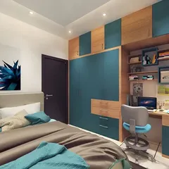 A compact bedroom that includes a fully integrated study unit. The desk is built right into the wardrobe, saving space while providing a dedicated area for work or homework.