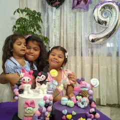 Family, love, and cake. These are the moments that matter most. My daughters gathered around the special birthday cake, a sweet memory of a day filled with joy and celebration.