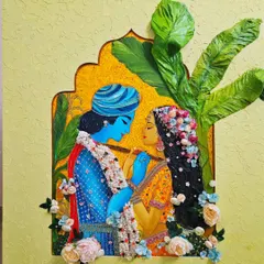Our "Garden of Love" piece, a mixed-media 3D artwork depicting Radhe Krishna. We combined painting with sculptural elements and delicate handmade flowers to capture a feeling of eternal love and serenity.