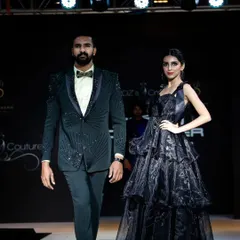 This custom-tailored men's suit features a dark green jacket with intricate black beadwork, paired with a classic bow tie. It's a great example of how I blend traditional tailoring with unique embellishments.
