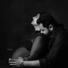 The quiet connection between a couple before their family grows. This intimate black and white portrait captures a moment of peace and shared love during a maternity session.