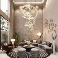 Nature is the ultimate luxury. In this drawing room, I incorporated organic forms through a spiraling chandelier and etched wall motifs, blending the elegance of the indoors with the tranquility of the natural world.