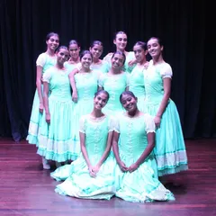 A moment of togetherness after a performance. The bond between our dancers is a huge part of our strength as a company.