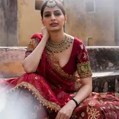 The perfect bridal portrait. This designer lehenga features beautiful embroidery and a classic silhouette for the modern bride.