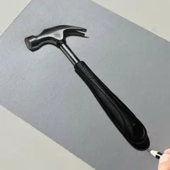 A finished realistic drawing of a hammer. I used a mix of markers and colored pencils to render the shiny metal head and the matte rubber handle.