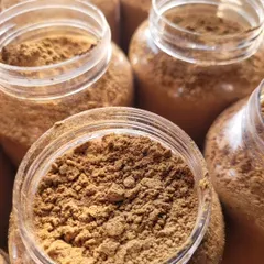 Jars of my Chocolate Ubtan, freshly prepared. This is a traditional Indian skincare remedy that I make to help with skin brightening and polishing.