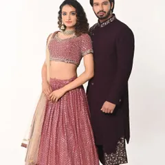 A full-length shot of the couple from our ethnic wear photoshoot. The coordinated colors create a harmonious and visually stunning look.
