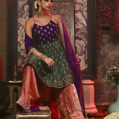 A vibrant shot showcasing a sharara set from Soho Begum. The studio's neutral walls allow bold colors to pop, making it ideal for creating eye-catching images for your fashion lookbook or social media campaign.