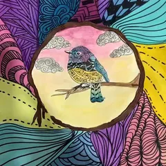 We just love tangling with Zentangles! This beautiful piece by a 12-year-old student combines watercolor with intricate black ink patterns, creating a mesmerizing effect.