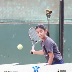 Eyes on the ball. A junior player prepares to connect with a forehand, demonstrating the concentration required during high-stakes tournament play.