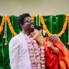 The moment it becomes real. Nikita and Dnyanratna, full of smiles and relief after the varmala exchange. The joy and love in this hug is palpable.