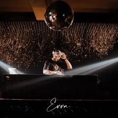 A wide shot of my setup at Evva. The lighting, the disco ball, and the console all come together to create the perfect club atmosphere where people can escape and enjoy the music.