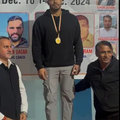 Celebrating a huge win. Our boxer stands on the podium with his gold medal from the Delhi State Boxing Championships. This is what dedication looks like.