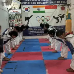 Bowing is a sign of respect for our coaches, teammates, and the art of Taekwondo. It's a core part of our training.